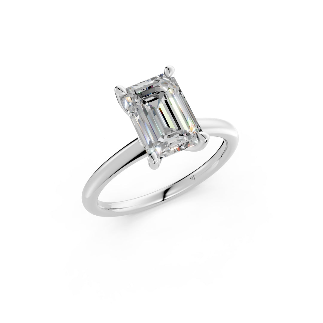 Maira Emerald Solitaire Diamond Womens Ring