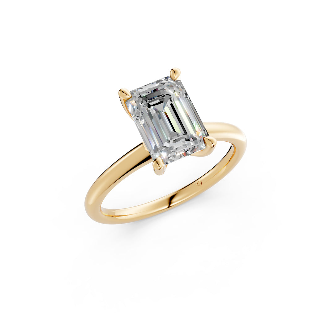 Maira Emerald Solitaire Diamond Womens Ring