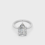 Load and play video in Gallery viewer, Emira Pear Solitaire Diamond Womens Ring
