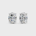 Load and play video in Gallery viewer, Iaira Oval Solitaire Diamond stud Earring
