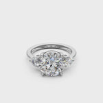 Load and play video in Gallery viewer, Kiki Round Solitaire Diamond 3 stone Ladies Ring
