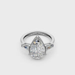 Load and play video in Gallery viewer, Rosie Pear Solitaire Diamond 3 stone Ladies Ring
