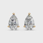 Load and play video in Gallery viewer, Havya Pear Solitaire Diamond stud Earring
